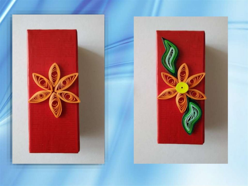 На коробку наклеиваем лепестки цветка, в центр цветка приклеиваем желтую серединку, по краям от цветка –листья. Если коробка